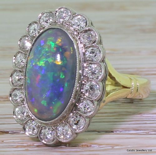 Art Deco Black Opal & 1.50 Carat Old Mine Cut Diamond Cluster Ring, Circa 1925
