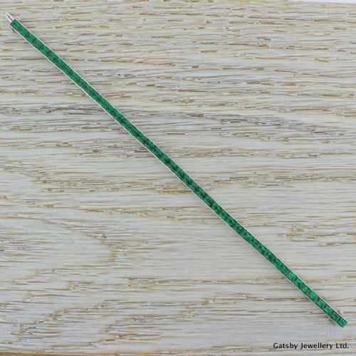 fig 1. Art Deco 6.90 Carat French Cut Emerald Line Bracelet, Platinum, circa 1930