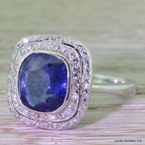 Art Deco 4.00 Carat Cushion Cut Sapphire & Double Diamond Halo Ring, Circa 1935

