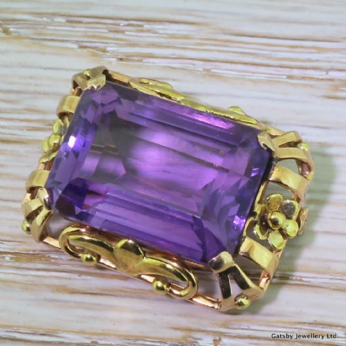 Mid Century 20.00 Carat Emerald Cut Amethyst Brooch, Circa 1950

