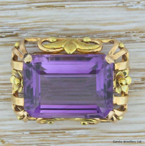 fig 1. Mid Century 20.00 Carat Emerald Cut Amethyst Brooch, circa 1950
