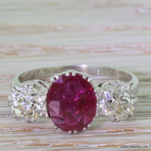fig 1. Art Deco 2.20 Carat Ruby & 1.63 Carat Old Cut Diamond Trilogy Ring, circa 1935
