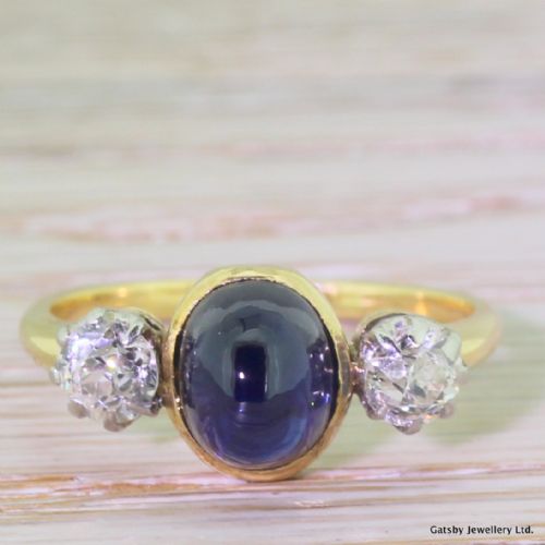 fig 1. Art Deco 2.00 Carat Cabochon Sapphire & 0.70 Carat Old Cut Diamond Trilogy Ring, circa 1920
