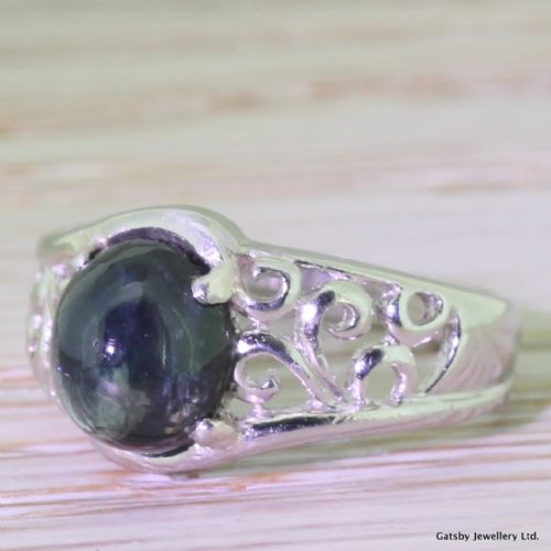 Edwardian 2.50 Carat Cabochon Sapphire Platinum Ring, Circa 1910
