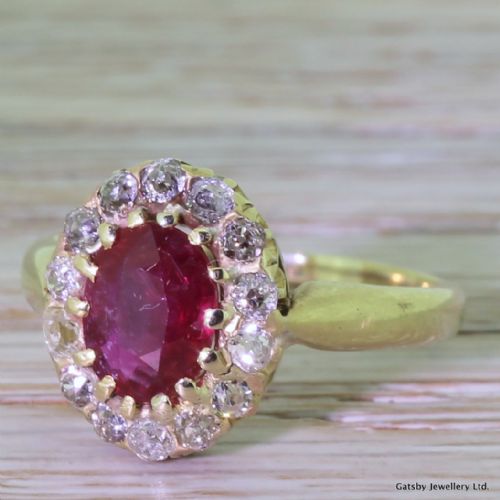 Victorian 1.25 Carat Ruby & 0.45 Carat Old Cut Diamond Cluster Ring, Circa 1900
