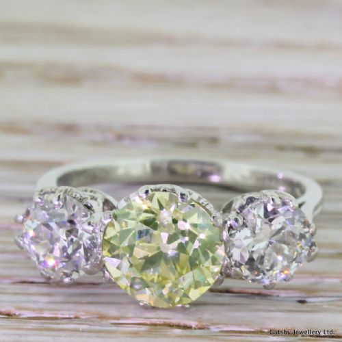 fig 1. Art Deco 3.54 Carat Fancy Greenish Yellow & White Old Cut Diamond Trilogy Ring, circa 1935
