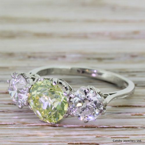 Art Deco 3.54 Carat Fancy Greenish Yellow & White Old Cut Diamond Trilogy Ring, Circa 1935
