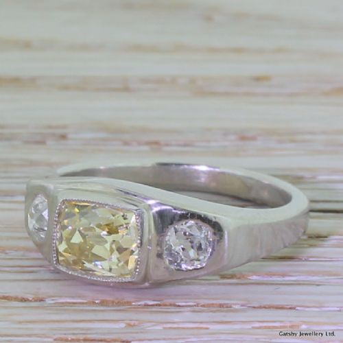 Art Deco 1.11 Carat Natural Fancy Yellow Old Cut Diamond Trilogy Ring, French, Circa 1920
