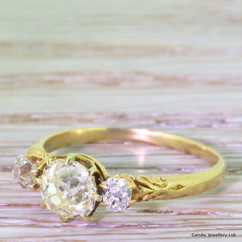 Victorian 1.46 Carat Light Yellow & White Old Cut Diamond Trilogy Ring, Circa 1900
