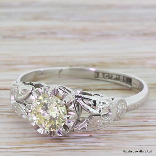 Art Deco 0.56 Carat Light Fancy Yellow Diamond Engagement Ring, Circa 1935
