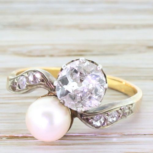 fig 1. Edwardian 1.07 Carat Old Cut Diamond & Pearl Crossover Ring, circa 1910