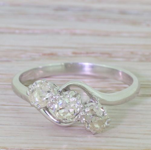 fig 1. Art Deco 0.85 Carat Old Cut Diamond Crossover Trilogy Ring, circa 1920