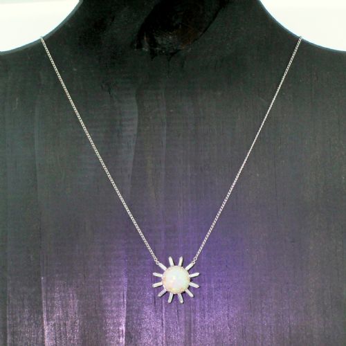 fig 1. Art Deco Opal & Baguette Cut Diamond “Sun Burst” Pendant, circa 1925