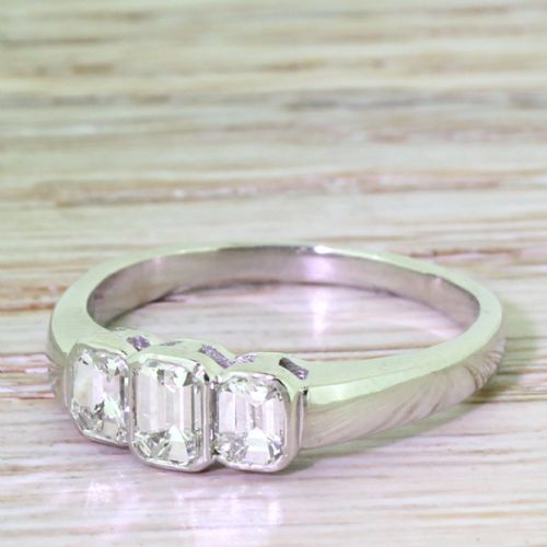 Retro 0.75 Carat Emerald Cut Diamond Trilogy Ring, Circa 1950
