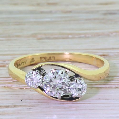 fig 1. Art Deco 0.60 Carat Old Cut Diamond Trilogy Crossover Ring, circa 1940