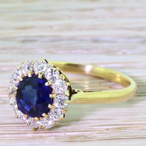 Victorian 1.40 Carat Natural Sapphire & Old Cut Diamond Cluster Ring, Circa 1900
