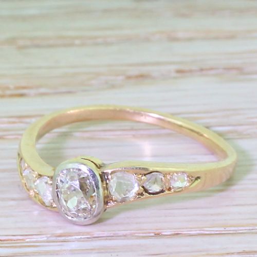 Edwardian 0.50 Carat Old Cut Diamond “Curve” Engagement Ring, Circa 1910
