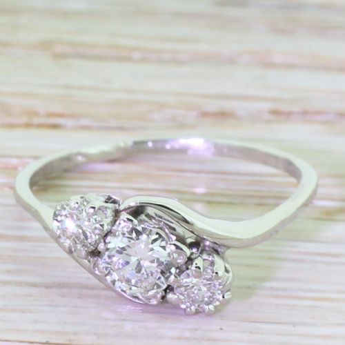 fig 1. Art Deco 0.70 Carat Transitional Cut Diamond Trilogy Crossover Ring, circa 1940