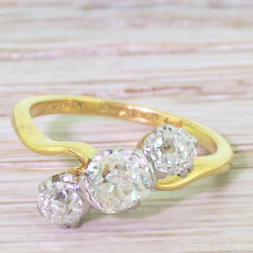 fig 1. Art Deco 1.28 Carat Old Cut Diamond Trilogy Crossover Ring, circa 1915
