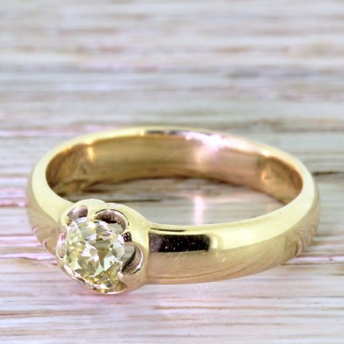 Victorian 0.75 Carat Fancy Light Yellow Old Cut Diamond Solitaire Ring, Circa 1900
