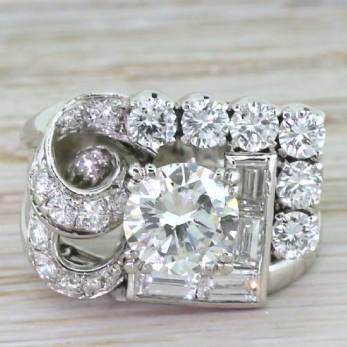 fig 1. Retro 3.00 Carat Transitional Cut & Baguette Cut Diamond Cocktail Ring, circa 1945
