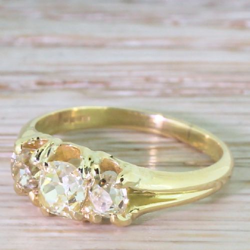 Victorian 1.20 Carat Fancy Light Yellow Old Cut Three Stone Ring, Circa 1900
