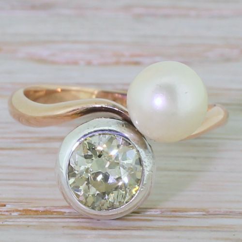 fig 1. Edwardian 1.15 Carat Fancy Light Yellow Diamond & Pearl Crossover Ring, circa 1905
