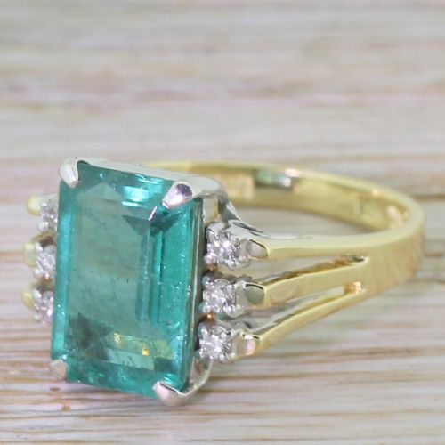 Retro 3.50 Carat Emerald Cut Emerald Solitaire Ring, Circa 1950
