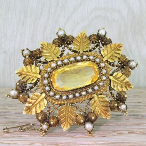 Mid Century 17.89 Carat Natural Yellow Ceylon Sapphire Brooch, Circa 1940
