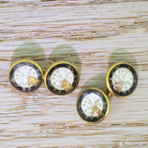 fig 1. A fitted red leather presentation box holding four oval Edwardian gold cufflinks set with reverse intaglio Essex crystal elk motifs.