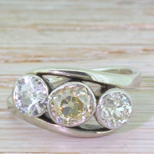 fig 1. Art Deco 2.20 Carat Cognac & White Old Cut Diamond Trilogy Crossover Ring, circa 1935
