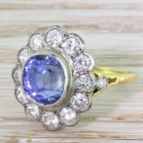 Art Deco 5.76 Carat Natural Ceylon Sapphire & Old Cut Diamond Cluster Ring, Circa 1925
