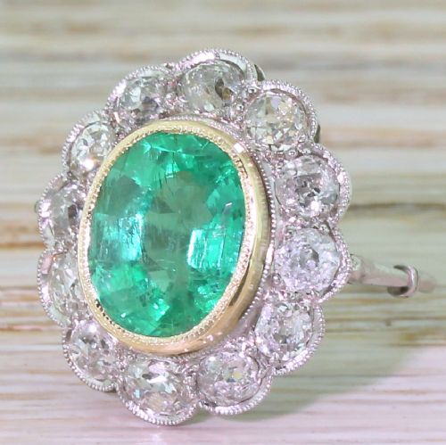 Edwardian 3.26 Carat Colombian Emerald & Old Cut Diamond Cluster Ring, Circa 1910
