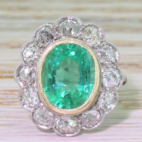 fig 1. Edwardian 3.26 Carat Colombian Emerald & Old Cut Diamond Cluster Ring, circa 1910
