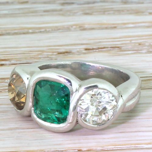 Retro Emerald, Fancy Orange & White Old Cut Diamond Three Stone Ring, Circa 1945
