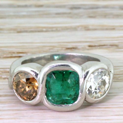 fig 1. Retro Emerald, Fancy Orange & White Old Cut Diamond Three Stone Ring, circa 1945