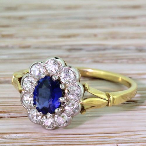 Edwardian 0.90 Carat Natural Sapphire & Diamond Cluster Ring, Circa 1910
