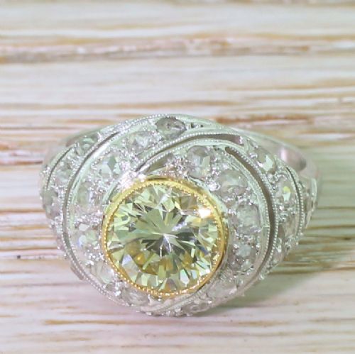fig 1. Retro 1.66 Carat Fancy Light Greenish Yellow Transitional Cut Bombé Ring, circa 1945