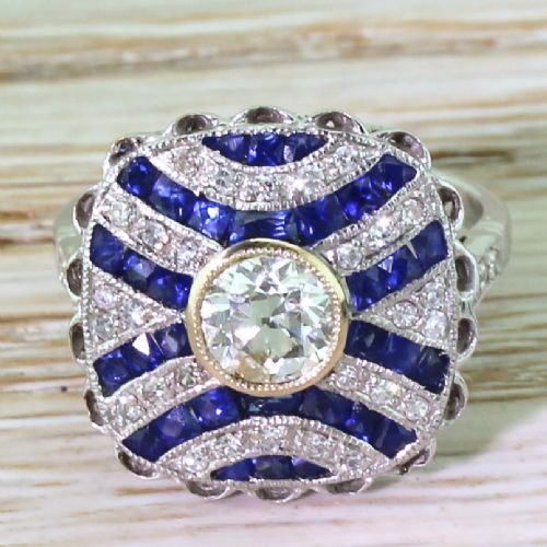 fig 1. 0.65 Carat Old European Cut Diamond & Calibré Cut Sapphire Ring, 18k White Gold
