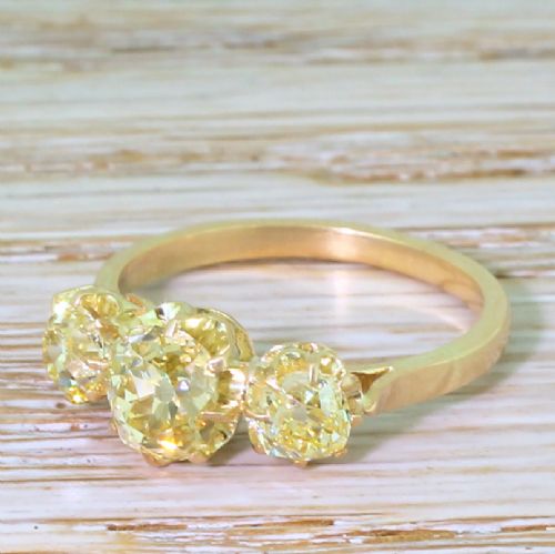 Art Deco 1.83 Carat Fancy Intense Yellow Old Cut Diamond Trilogy Ring, Circa 1930
