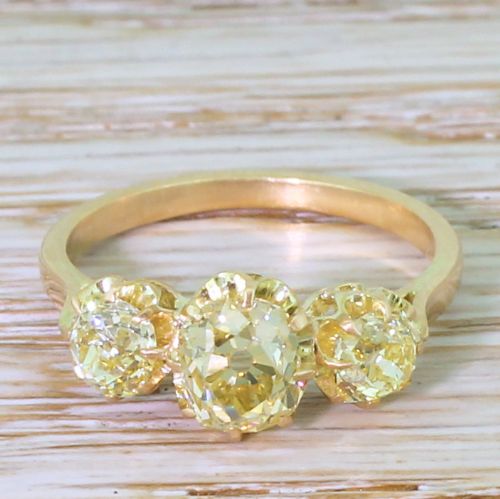 fig 1. Art Deco 1.83 Carat Fancy Intense Yellow Old Cut Diamond Trilogy Ring, circa 1930