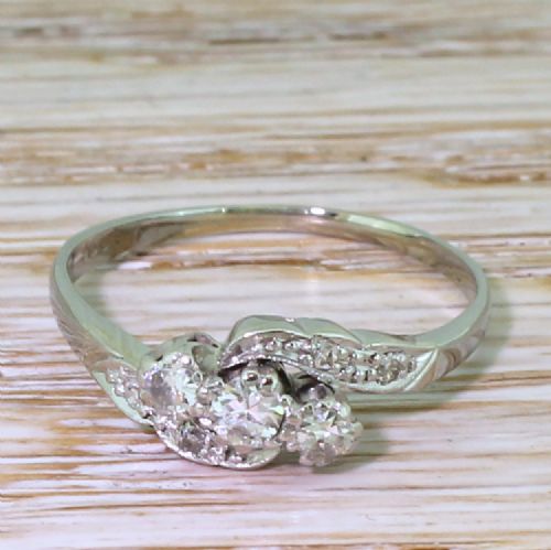 fig 1. Art Deco 0.30 Carat Transitional Cut Diamond Trilogy Crossover Ring, circa 1935