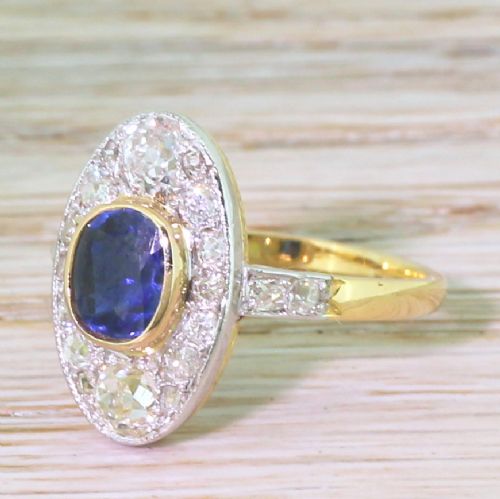 Edwardian 1.19 Carat Sapphire & 1.01 Carat Old Cut Diamond Cluster Ring, Circa 1910
