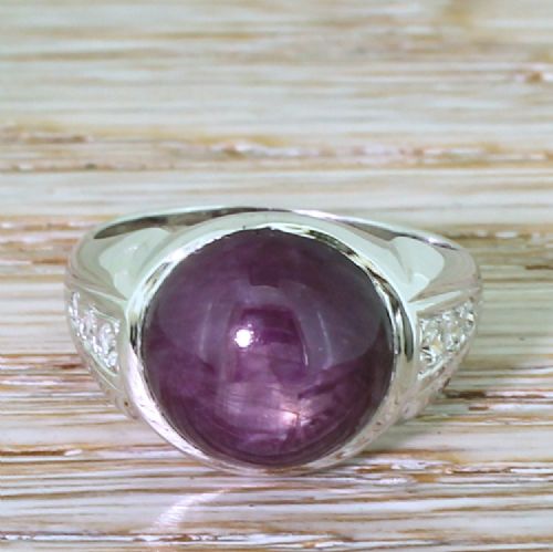 fig 1. Art Deco 10.43 Carat Cabochon Ruby Solitaire Ring, circa 1940