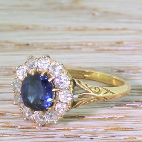 Victorian 2.22 Carat Natural Sapphire & Old Cut Diamond Cluster Ring, Circa 1900
