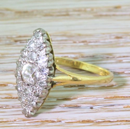 Mid Century 0.47 Carat Old Cut Diamond Navette Cluster Ring, Circa 1950
