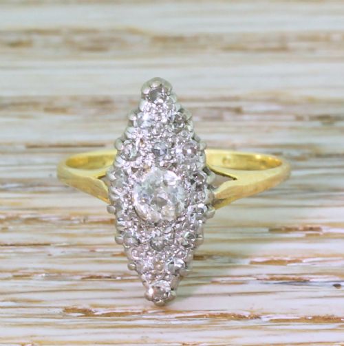 fig 1. Mid Century 0.47 Carat Old Cut Diamond Navette Cluster Ring, circa 1950