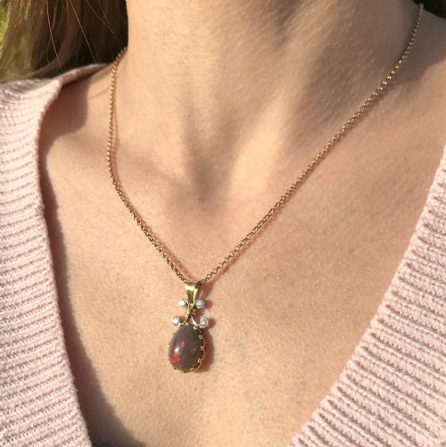 fig 1. Mid Century 5.73 Carat Black Opal & Diamond Pendant, circa 1965