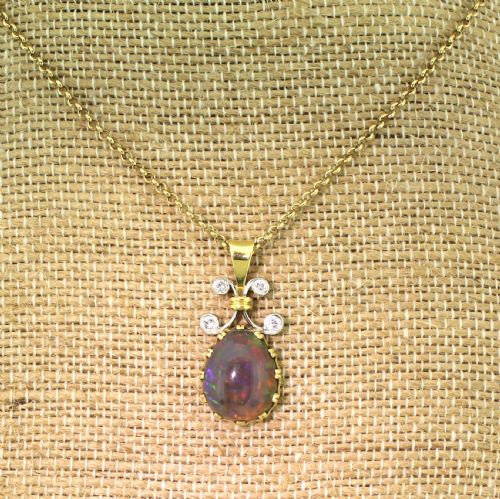 fig 2. Mid Century 5.73 Carat Black Opal & Diamond Pendant, circa 1965