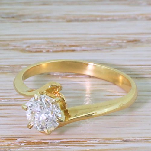 Late 20th Century 1.01 Carat Brilliant Cut Diamond Crossover Solitaire Ring, French
